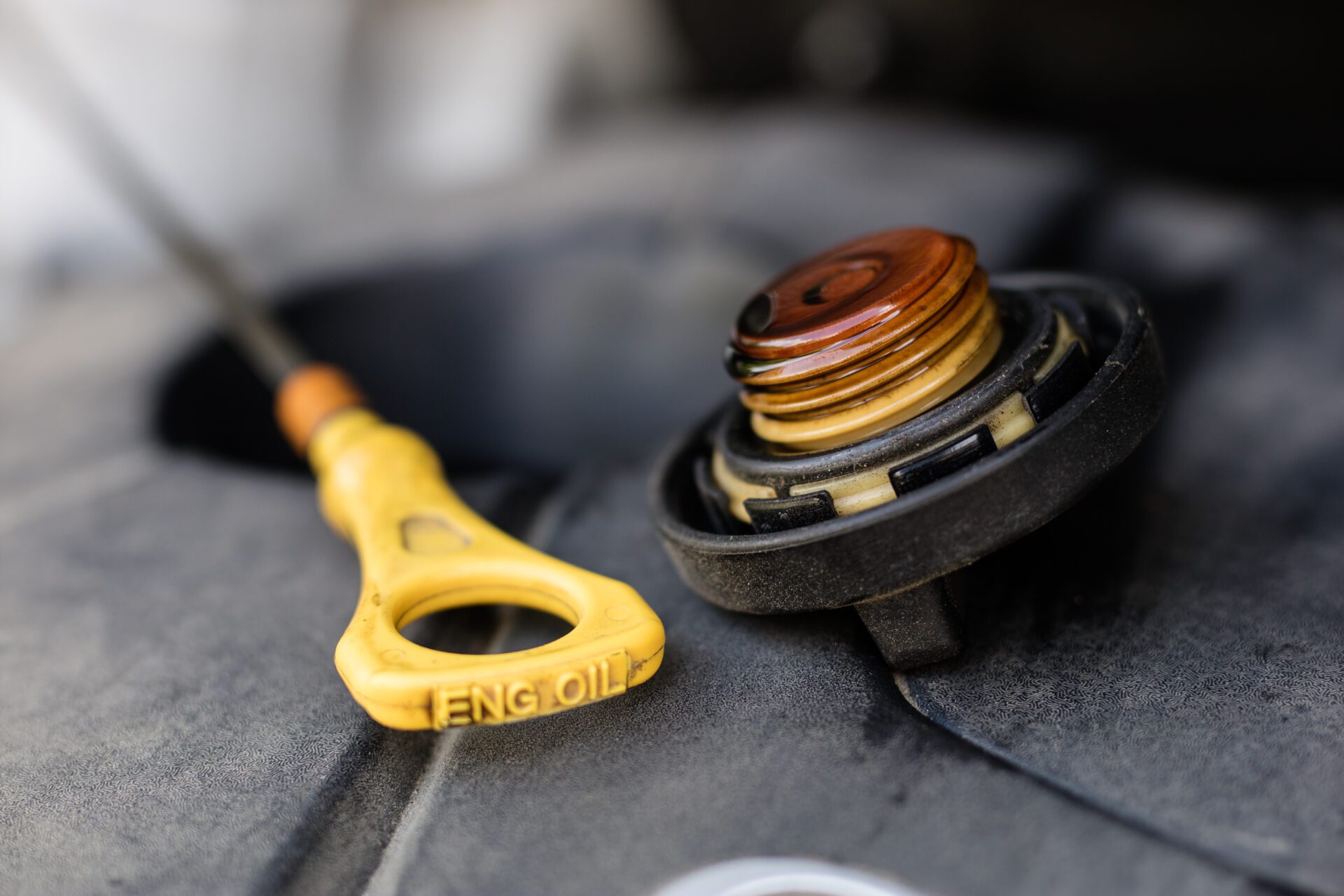 Oil filler for the car engine. Replenishing liquids in the drive