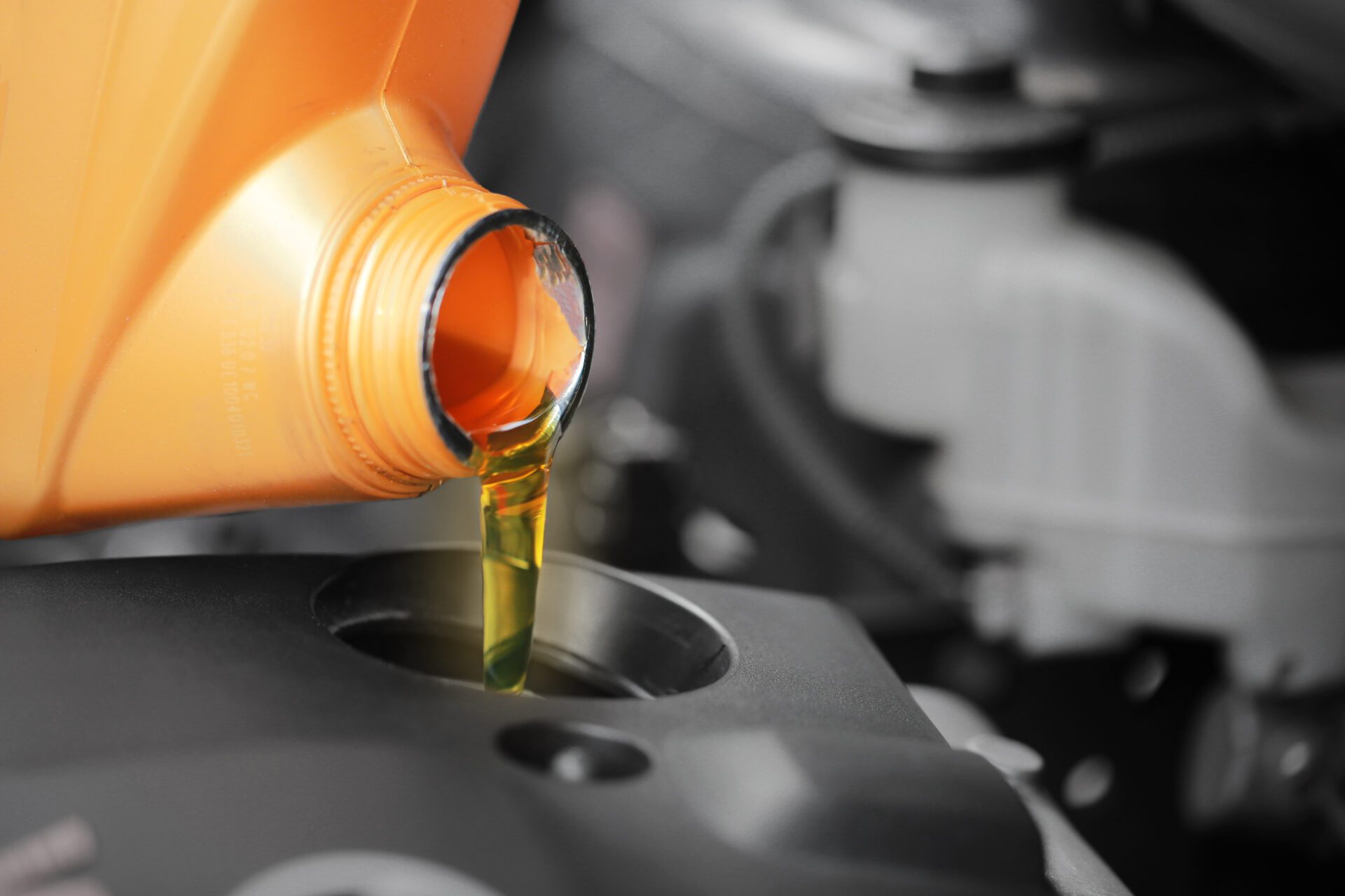 Close up, Pouring motor oil to car engine. Close up, Pouring motor oil to car engine.